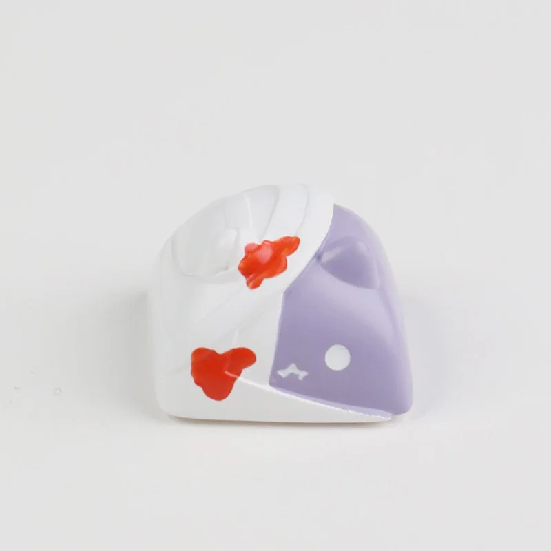 A close-up side view reveals the quirky handcrafted resin zombie cat keycap, highlighting its unique spooky-cute details and artisanal quality for mechanical keyboard.