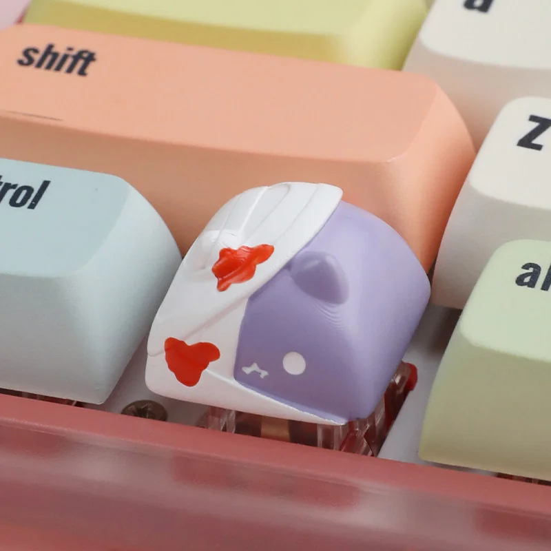 Quirky handcrafted resin zombie cat keycap for mechanical keyboards, showcasing its whimsical, spooky charm and artistic details.