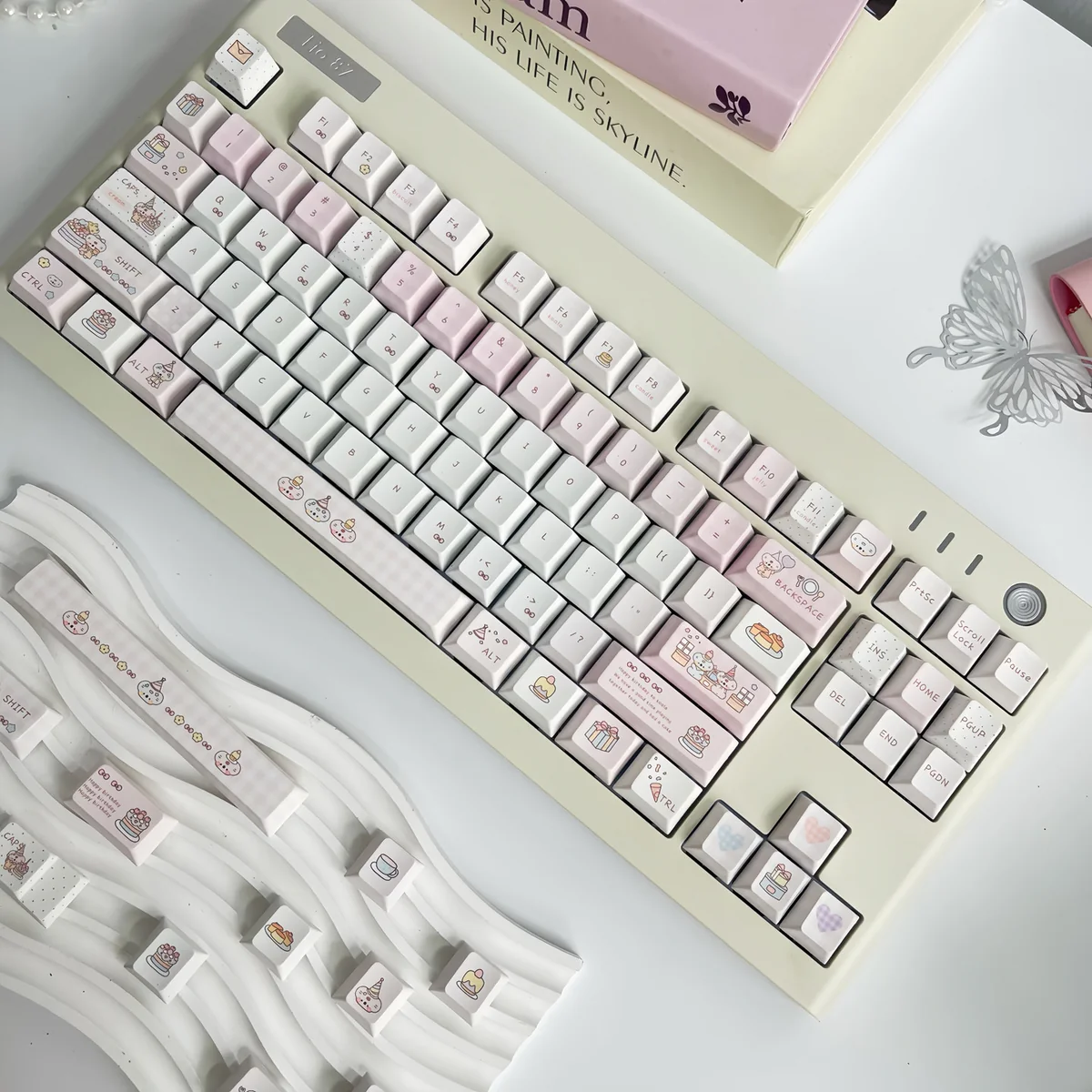 Adorable koala party PBT keycap, captured from a charming angle, features whimsical pastel design, emphasizing its durable quality and personalized keyboard.