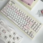 Adorable Koala Party PBT keycap, showcasing its charming, whimsical design in soft pastel colors. A durable, personalized keyboard charm.