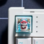 Handcrafted 3D artisan resin keycap: vibrant, whimsical animal hero. Artistic details from a unique angle, ideal for personalized keyboards.