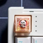 Handcrafted 3D artisan resin keycaps, vibrant whimsical fantasy and cute animal designs, shown from different angles for keyboard personalization.