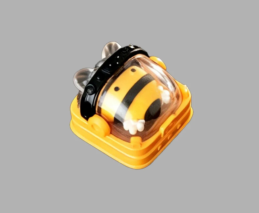 Main display image of the unique handcrafted Astronaut Bee Keycap, an intricate resin artisan piece.