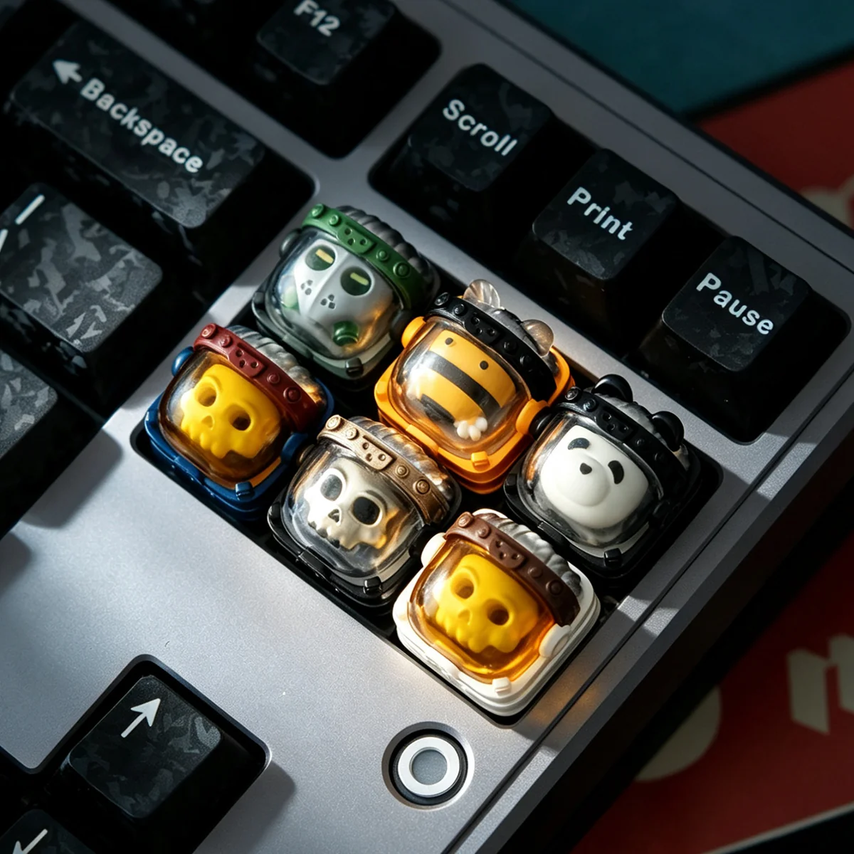 Artistic side profile of the Delta Force Astronaut Lethal Substance Stinger artisan keycap, revealing the stunning handcrafted translucent resin and intricate sci-fi asthetic.