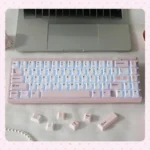 Close-up views of the whimsical bear tea party ceramic keycap set, showcasing the unique smooth pastel ceramic textures and intricate artistic details.
