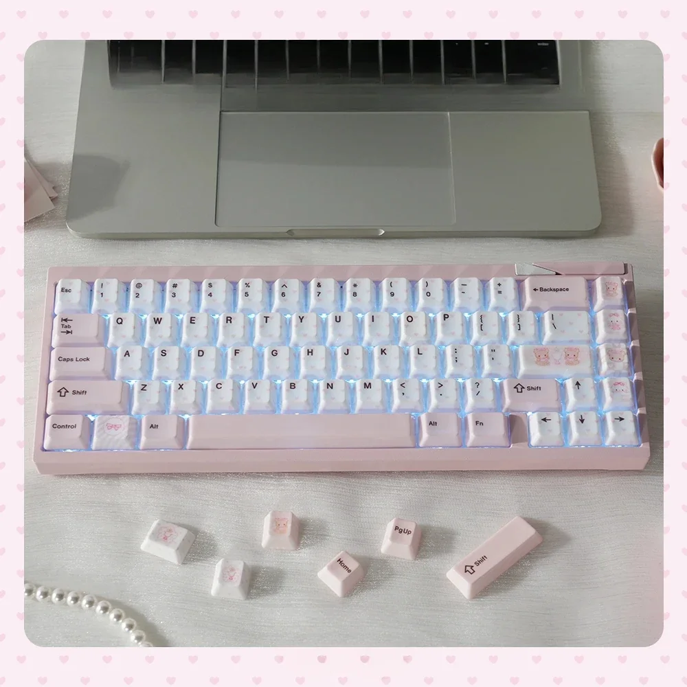 Close-up views of the whimsical bear tea party ceramic keycap set, showcasing the unique smooth pastel ceramic textures and intricate artistic details.