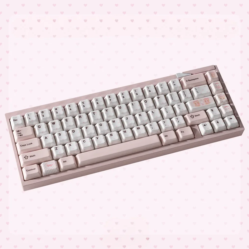 Close-up of a whimsical bear tea party ceramic keycap set, showcasing unique handcrafted pastel ceramic textures and charming bear designs.