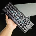 Artistic Bone Blade PBT keycaps for mechanical keyboards, shown from various angles, highlighting their unique side-lit legends, icy aesthetic.