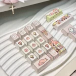 Whimsical Bunny Ice Cream PBT keycaps set, featuring adorable pastel bunnies and sweet ice cream motifs. This image shows a unique angle.