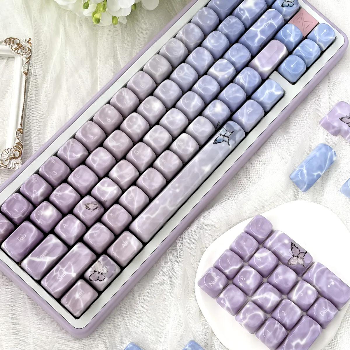 Ethereal Butterfly Keycaps Set with a luxurious jade-like feel, showcasing delicate butterfly glimmer designs and the elegant profile from multiple angle.