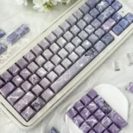 Ethereal Butterfly Keycap Set in ergonomic profile, beautifully displayed from various angles, emphasizing their luxurious jade-like feel and poetic butterfly.