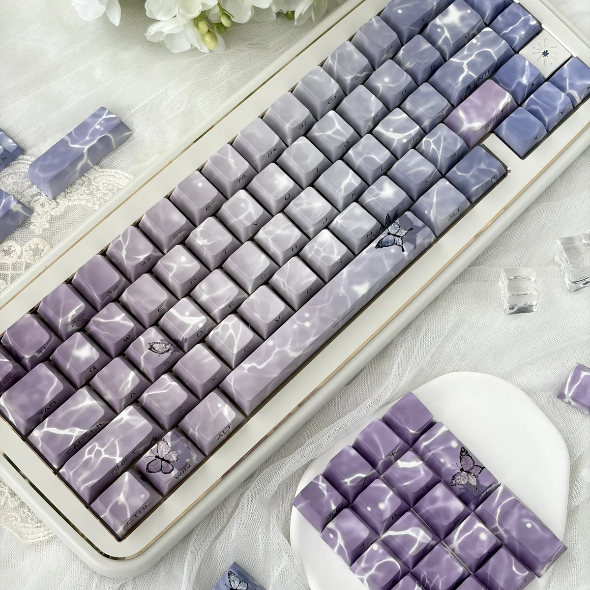 Ethereal Butterfly Keycap Set in ergonomic profile, beautifully displayed from various angles, emphasizing their luxurious jade-like feel and poetic butterfly.