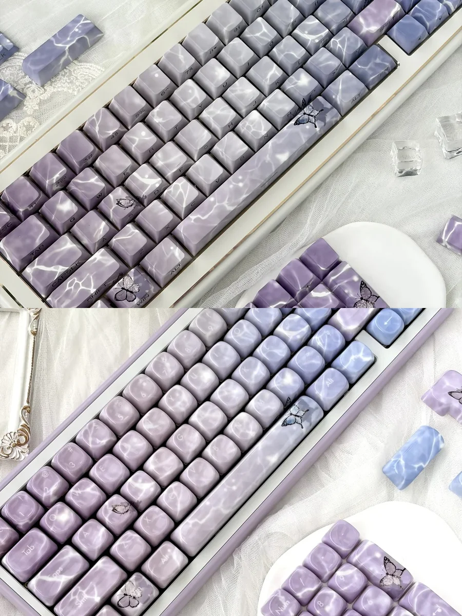 Stunning butterfly keycaps set with a luxurious jade-like feel, displaying a poetic glimmering butterfly design and ethereal aesthetic.