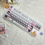 Cafe Stella and the Reaper's Butterflies Shiki Natsume PBT backlit keycaps set showcased from multiple artistic angles, highlighting dreamy anime character art.