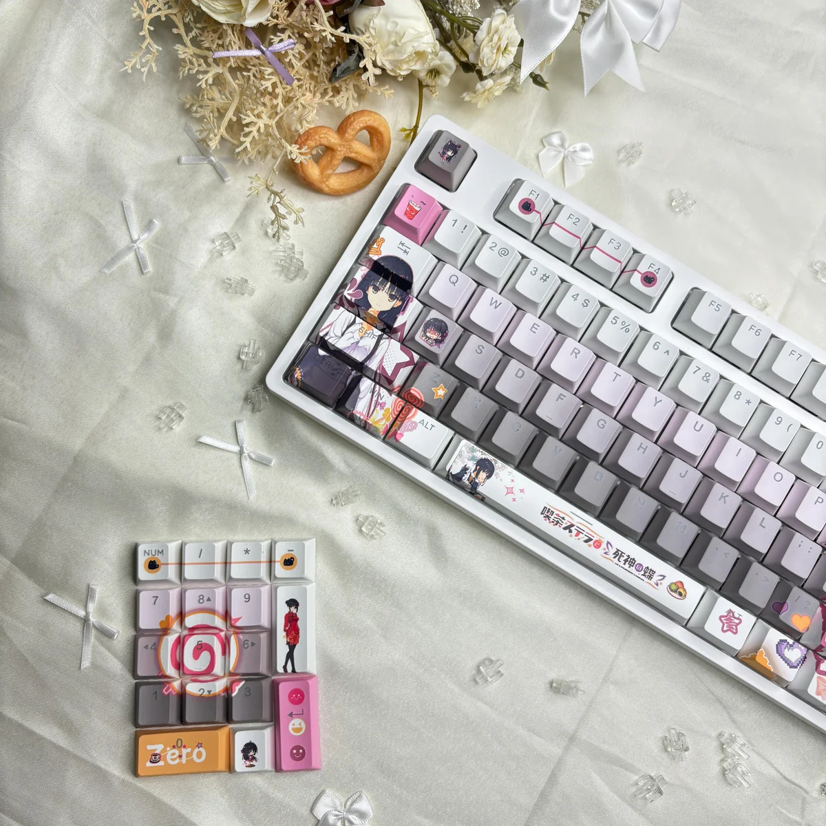 A collection of Cafe Stella and the Reaper's Butterflies Shiki Natsume PBT backlit keycaps, showcasing various angles with dreamy anime character art and soft.