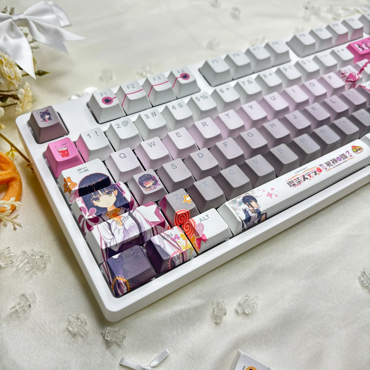 Cafe Stella and the Reaper's Butterflies Shiki Natsume PBT backlit keycaps set from multiple angles, highlighting dreamy anime character art, soft hues, and translucent legends.
