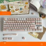 Adorable Caramel Cat PBT Cat Keycap, a whimsical artisan keycap with warm caramel tones and charming feline details, perfect for any keyboard.