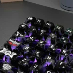 Detailed view of Dark Angel Carbon Fiber Backlit PC keycaps, revealing sleek carbon fiber texture and dark angel motifs. Premium PC keycaps.
