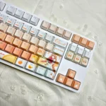 Close-up of Charming Mahiru Shiina PBT backlit keycaps, showcasing the angelic design and luminous glow from various angles, perfect for premium mechanical keyboard.