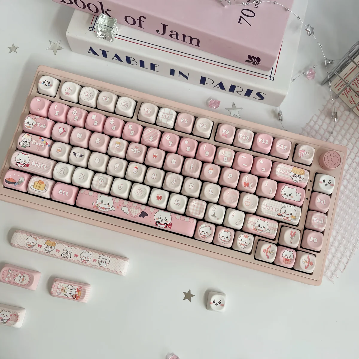 Adorable whimsical pink and white Chiikawa PBT dye-sub MOA keycaps, shown from various angles, perfect for a charming desk aesthetic.
