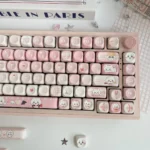Adorable Chiikawa PBT dye-sub MOA keycap set in whimsical pink, showcasing multiple angles of the charming characters for an adorable desk setup.