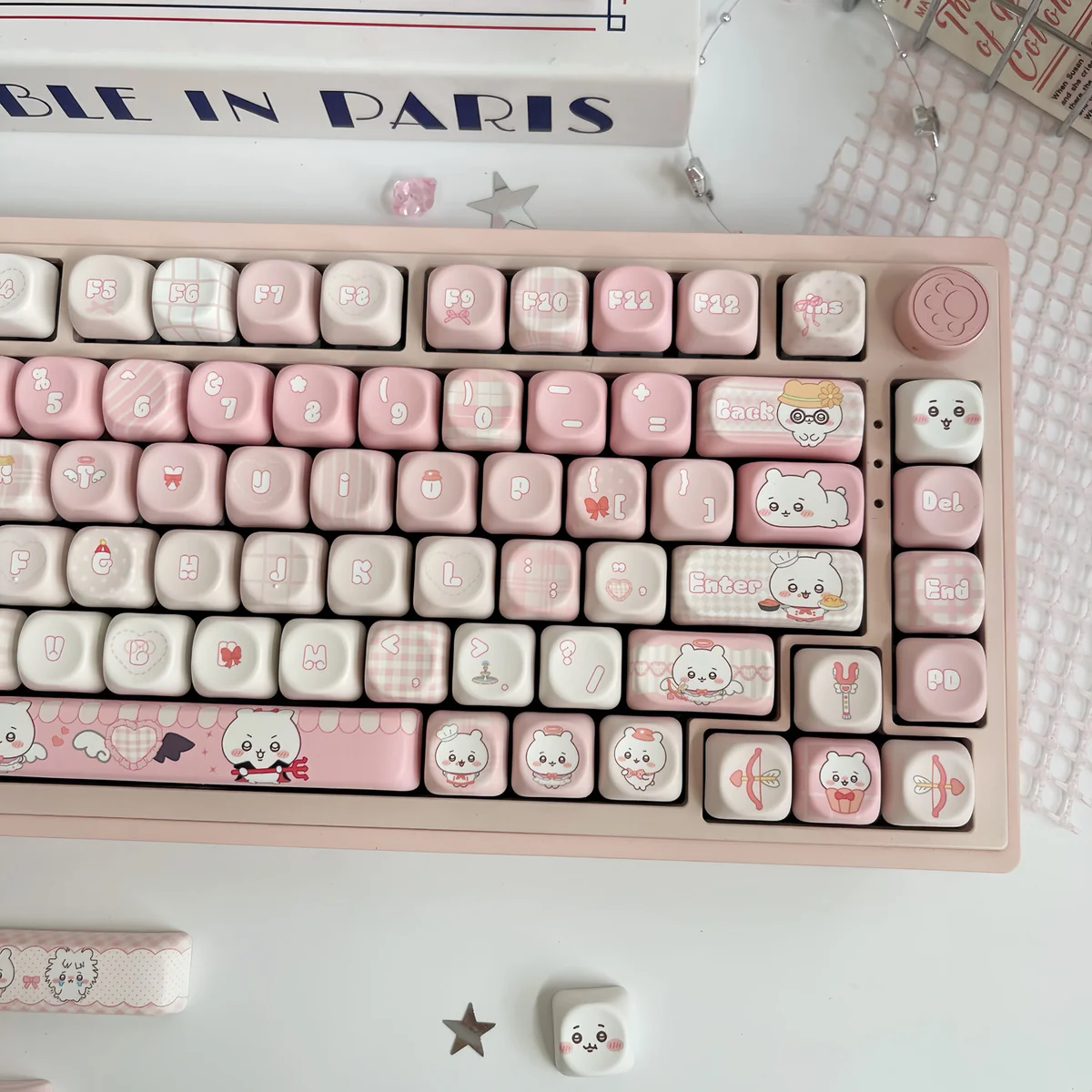 Adorable Chiikawa PBT dye-sub MOA keycap set in whimsical pink, showcasing multiple angles of the charming characters for an adorable desk setup.