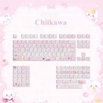 Adorable Chiikawa keycaps, a pink MOA PBT dye-sub set, shown from various angles. Features whimsical pink and white characters for a soft, pastel design.