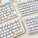 A detailed view of the Cloud Sheep Keycaps set from various perspectives, emphasizing the dreamy pastel cloud and playful sheep design with its milky.