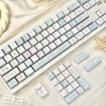 Cloud Sheep Keycaps: multiple views of dreamy pastel clouds and playful sheep, showcasing smooth milky textures and versatile profiles.
