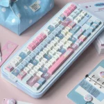 Playful Cowboy Sweetheart PBT Cherry keycaps in whimsical blue and pink, showcasing their charming western design from various angles.