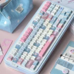 Cowboy Sweetheart Keycaps in PBT Cherry profile, featuring a playful blue and pink western design for a distinctive keyboard.