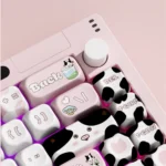 Playful R66 MuMu Dairy Cow custom mechanical keyboard, highlighting its hot-swappable switches, triple-mode connectivity, and charming cow-themed.