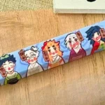 View the exclusive Playful Demon Slayer Oiran PBT keycap from various angles, revealing its vibrant anime novelty design and unique parody illustration.