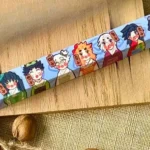 Multiple angles of the exclusive Playful Demon Slayer Oiran PBT keycap, showcasing its vibrant anime parody design. Novelty Demon Slayer keycap.