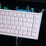 Artistic Shinobu Kocho Demon Slayer keycaps in vibrant blue, showcasing unique messy line art and fierce spirit. A 73-key front-engraved set.