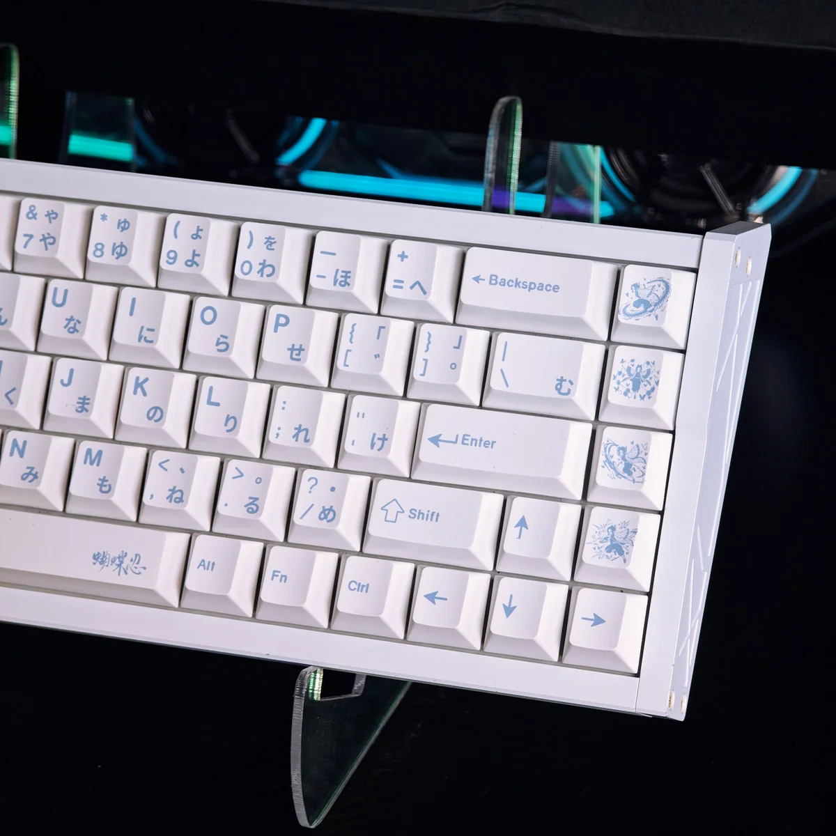 Artistic Shinobu Kocho Demon Slayer keycaps in vibrant blue, showcasing unique messy line art and fierce spirit. A 73-key front-engraved set.