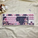 Elaina Wandering Witch PBT backlit keycaps from a unique angle, revealing the vibrant dye-sublimated legends and luminous glow.