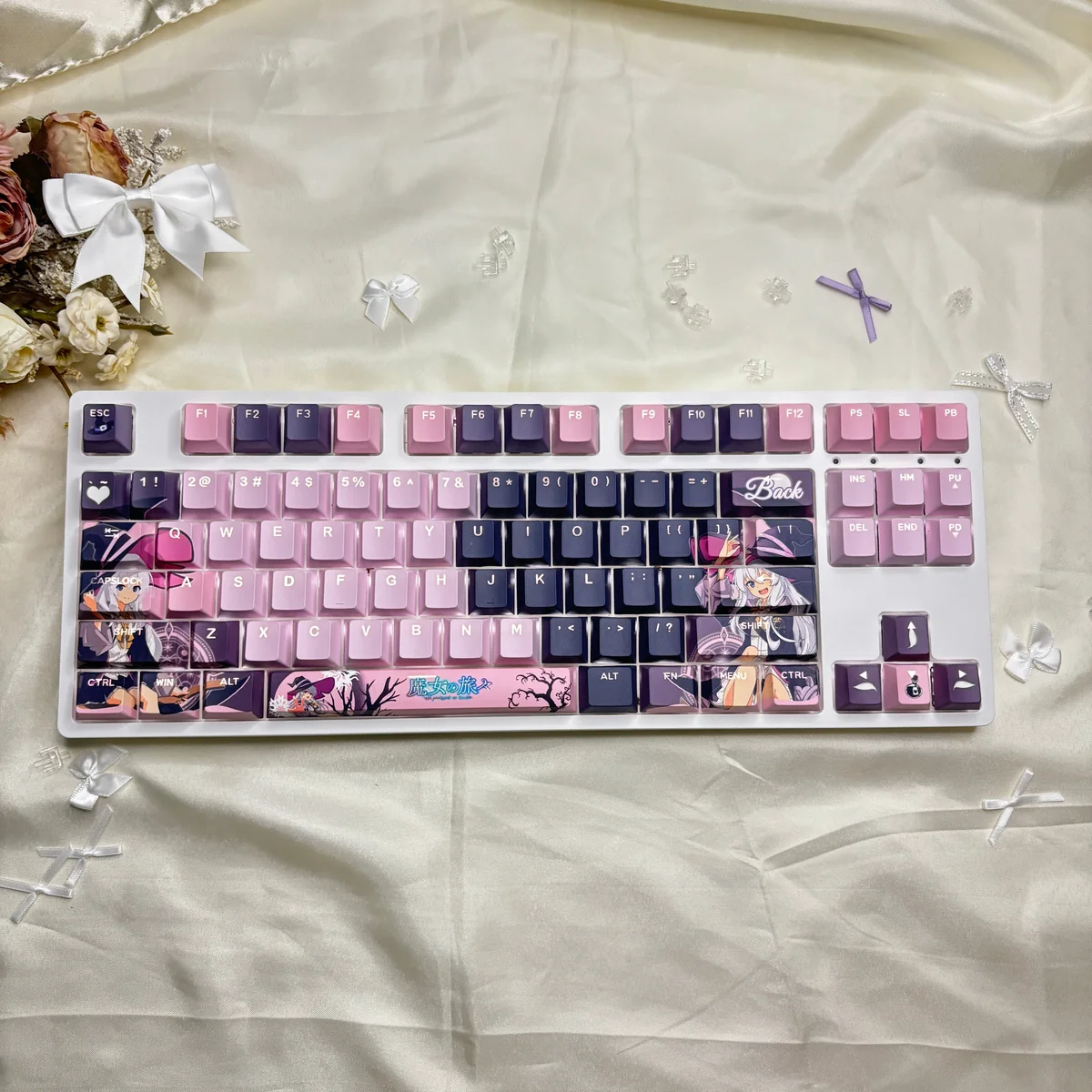 Elaina Wandering Witch PBT backlit keycaps from a unique angle, revealing the vibrant dye-sublimated legends and luminous glow.