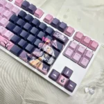 Elaina Keycaps Wandering Witch PBT backlit set shown from multiple artistic angles, emphasizing the dye-sublimated legends and durable PBT set.