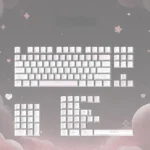 Detailed views of the enchanting fairy tale tea party PBT keycaps, showcasing their whimsical illustrations and soft pastel hues from various angles.