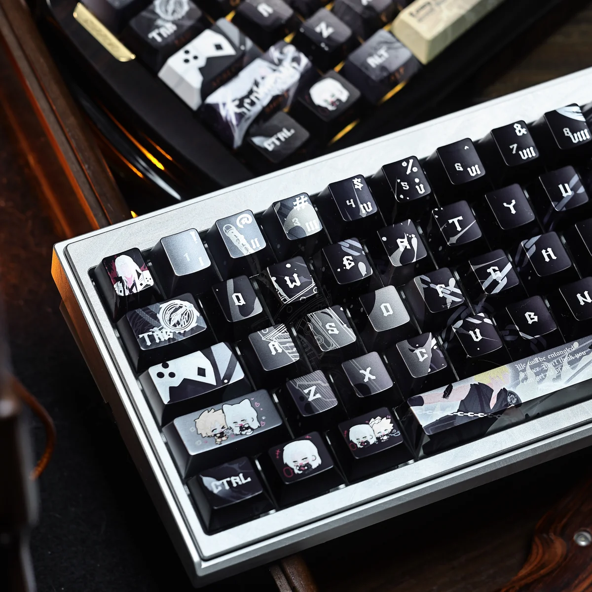 Detailed views of the iconic Final Fantasy VII Sephiroth Cloud PBT side-engraved keycap, showcasing its subtle character motifs and sophisticated metallic finish.