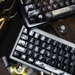 Iconic Final Fantasy VII Sephiroth Cloud PBT side-engraved keycap, elegantly displayed from multiple angles, highlighting its subtle character motifs and sophistic.