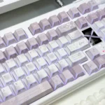 Vintage Rose PBT Keycap Set: durable PBT with subtle side-printed legends. Soft hues, artistic vintage rose garden aesthetic.