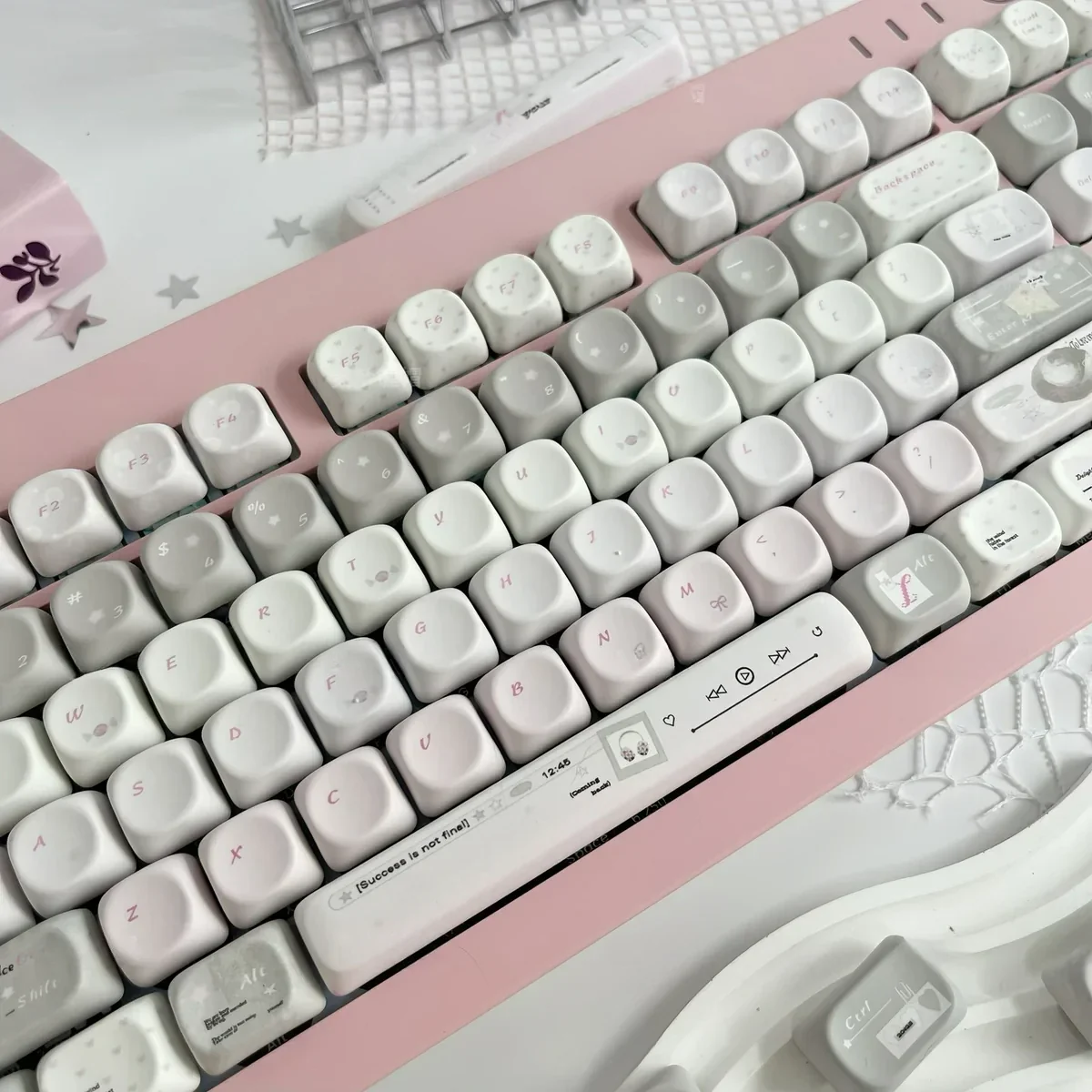 Elegant French Dream PBT MOA keycaps set from various angles, showcasing soft pastel hues and delicate vintage French patterns, evoking a serene dreamscape.