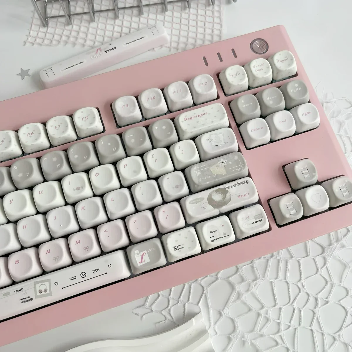 Elegant French Dream PBT MOA Keycaps Set gallery displaying various angles, highlighting their soft pastel hues, delicate vintage French patterns.
