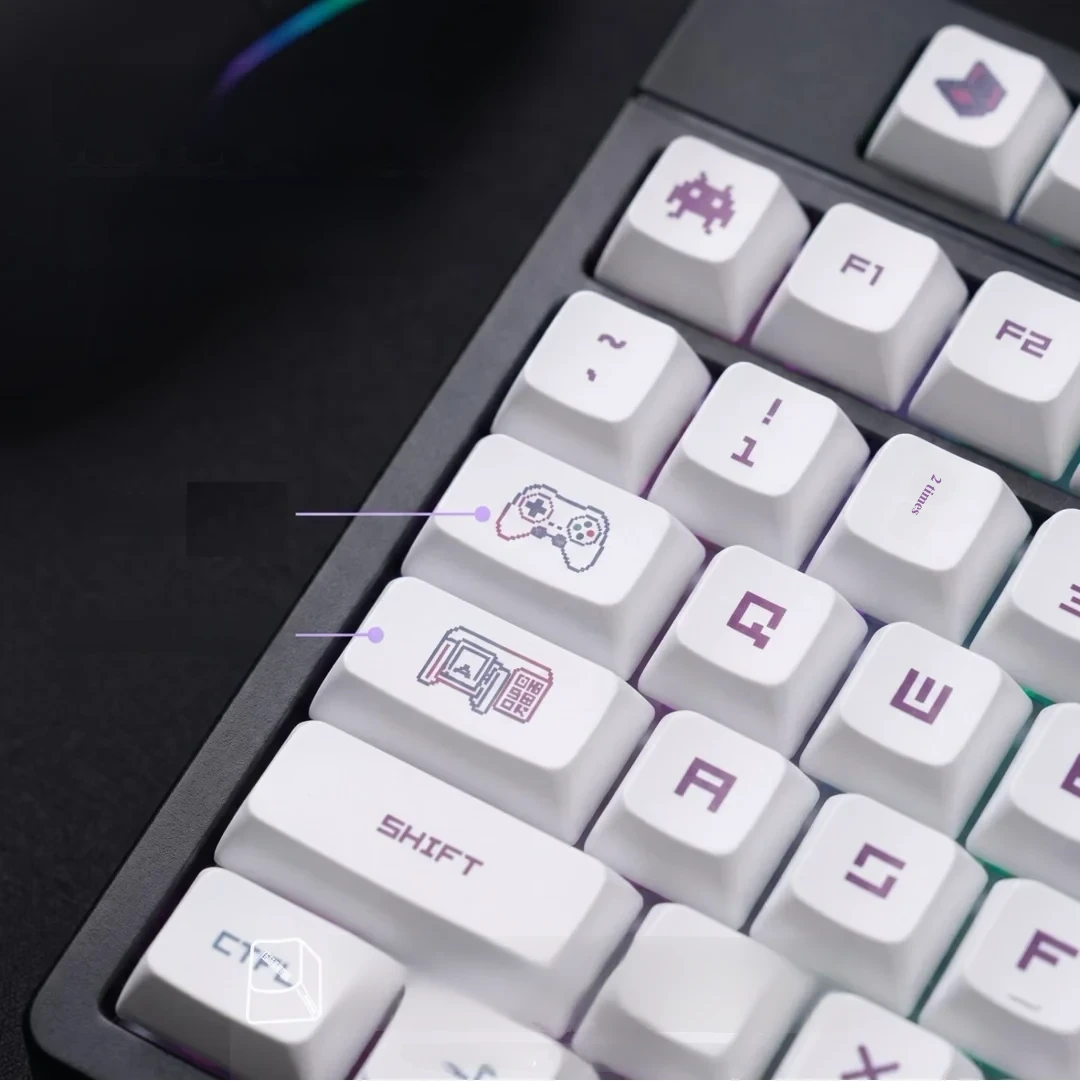 A vibrant set of PBT XDA gaming keycap set, playfully designed with retro pixel art, displayed from various angles. Enhances any gaming setup.