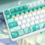 Ethereal Barbatos Genshin Impact PBT keycaps set from a distinct angle, highlighting the side-lit design with translucent and wind-inspired motifs.