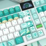 Various views of Barbatos Ethereal side-lit PBT Genshin Impact keycaps set, featuring translucent wind-inspired designs and glowing aesthetics.
