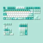 Genshin Impact Barbatos Ethereal PBT side-lit keycaps set from multiple angles. Translucent wind motifs showcase their glowing aesthetic.