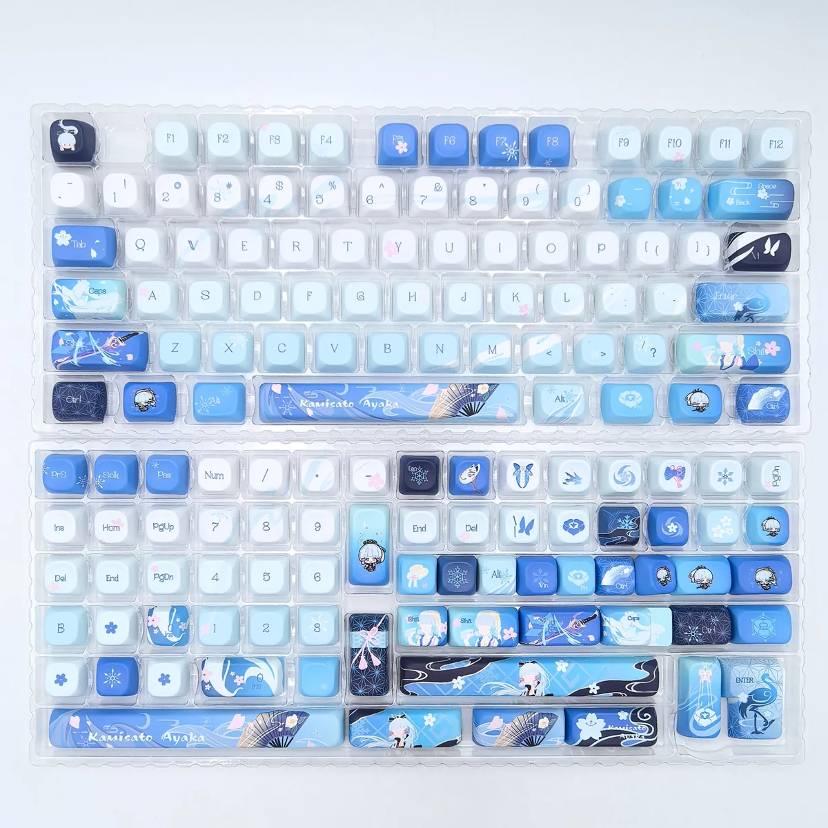 Elegant Kamisato Ayaka Genshin Impact keycaps set, featuring exclusive ice-themed designs. This premium MDA PBT set captures her serene beauty for your mechanical keyboard.